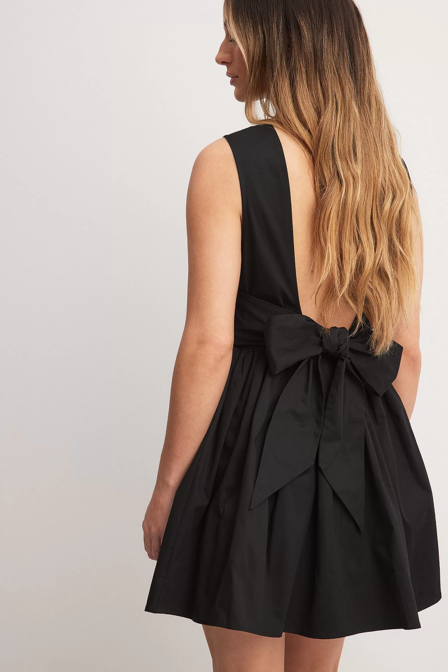 NA-KD Deep Back Bow Detail Mini Dress Black