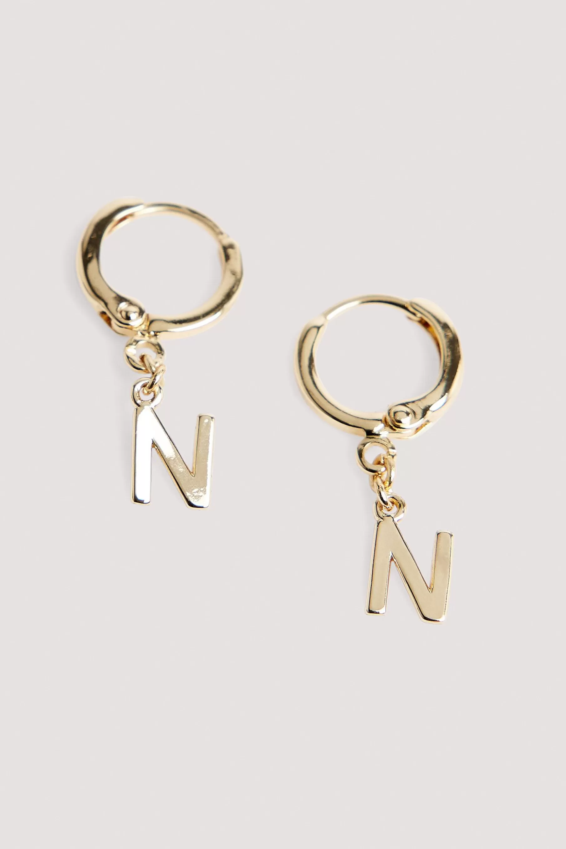 NA-KD Hanging Letter Hoops Gold